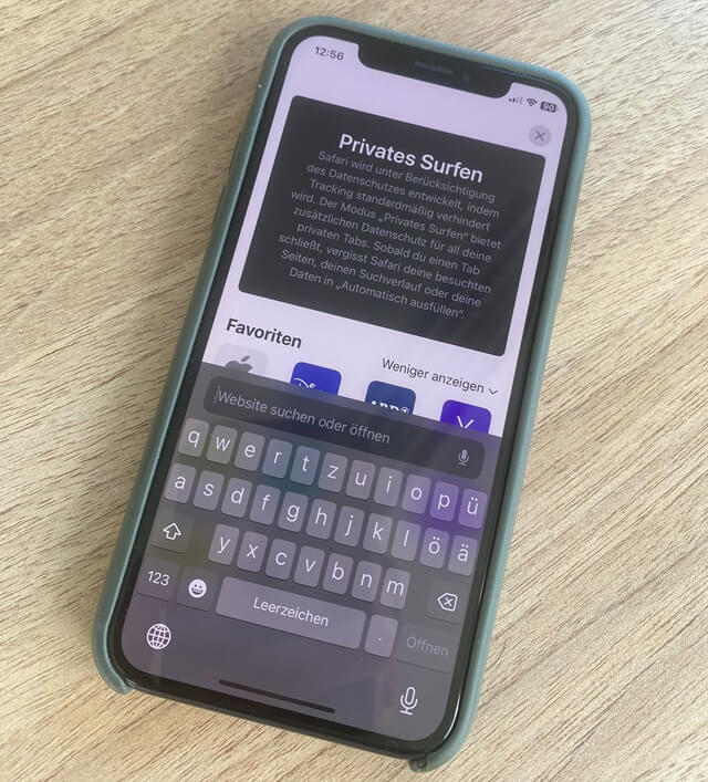 An iPhone with an incognito browser tab open