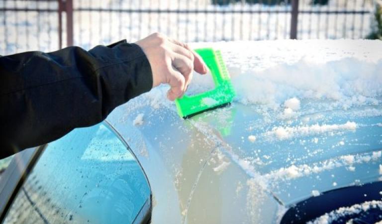 The car is cleared of snow