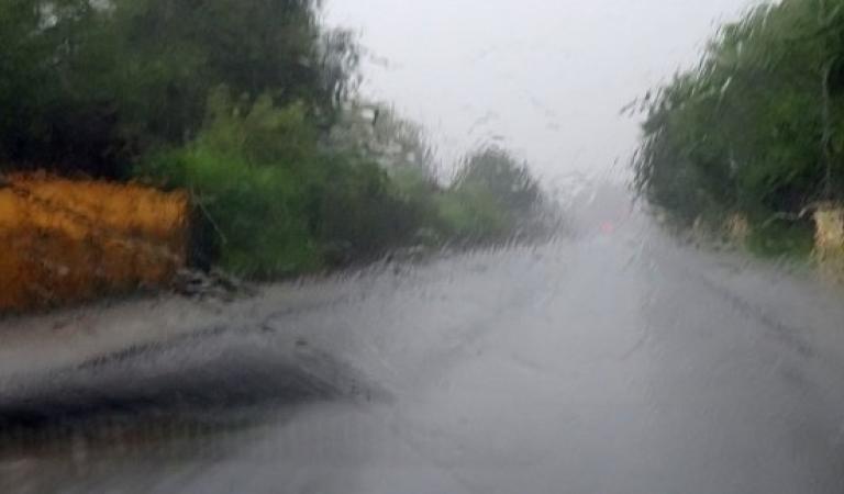 Rain-wetted windscreen - Drive carefully in heavy rain