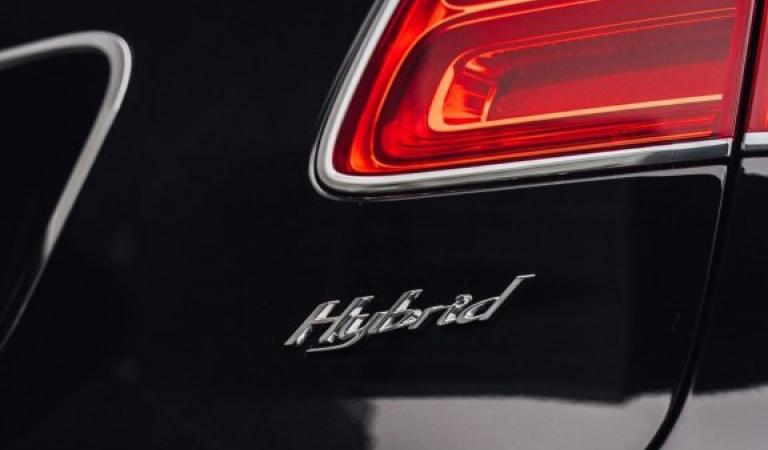 Rear light with hybrid inscription